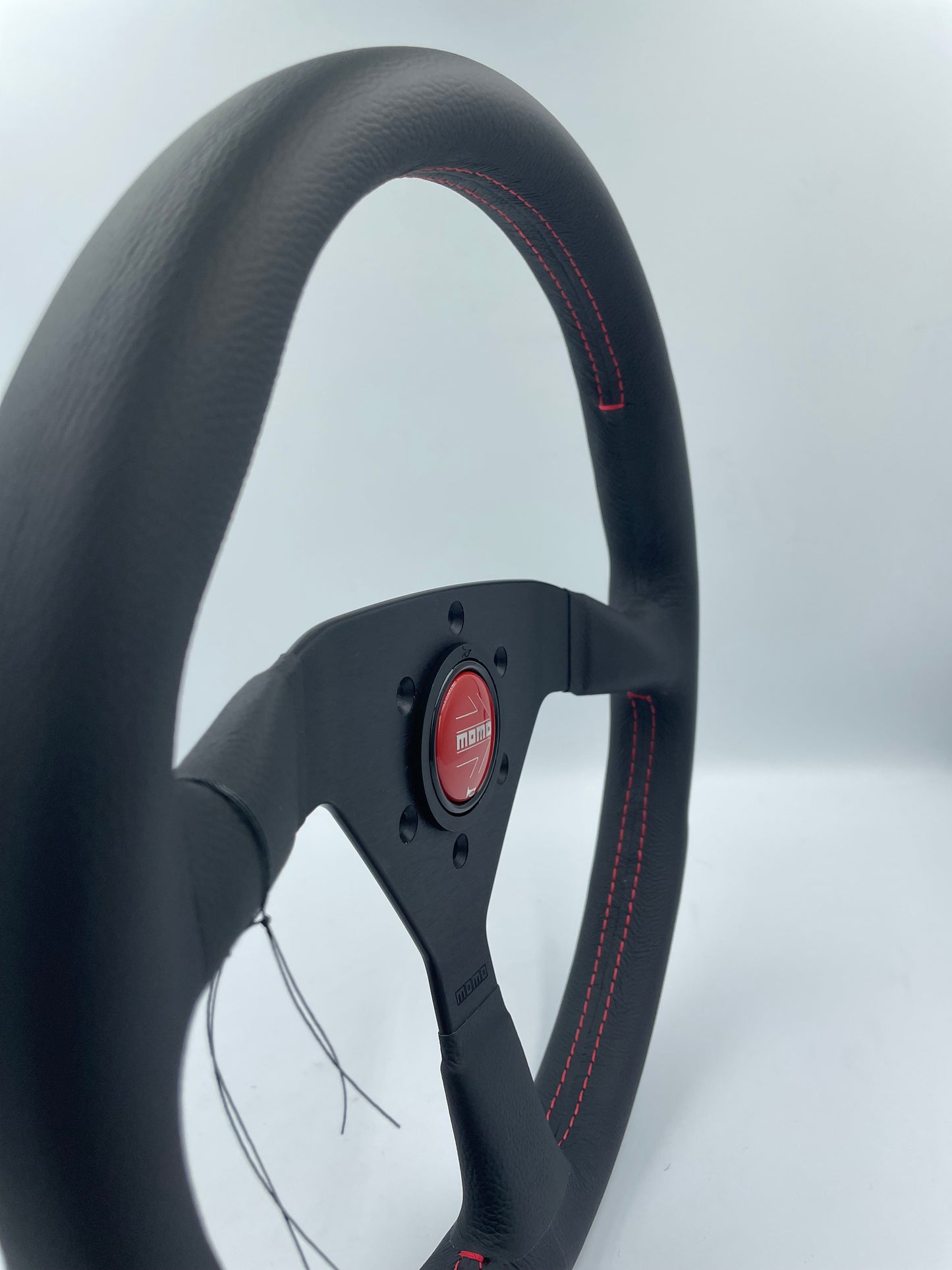 MOMO MONTECALO STEERING WHEEL: 350mm RED STITCH